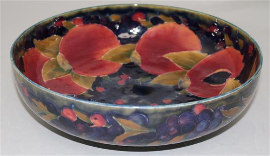 A Moorcroft pomegranate fruit bowl, c.1918, 26.5cm